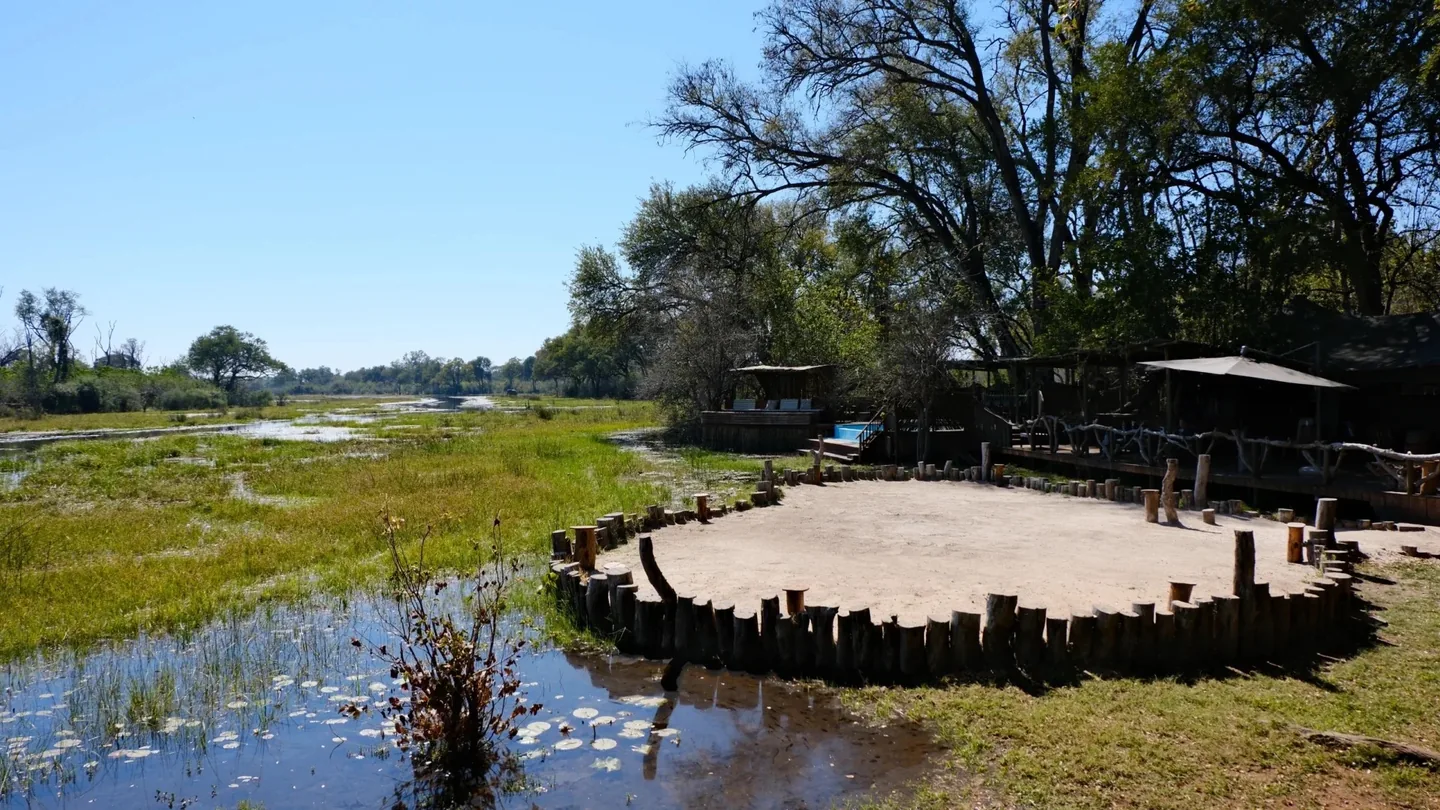 Safari lodge deck overlooking a wetland channel in the Okavango Delta