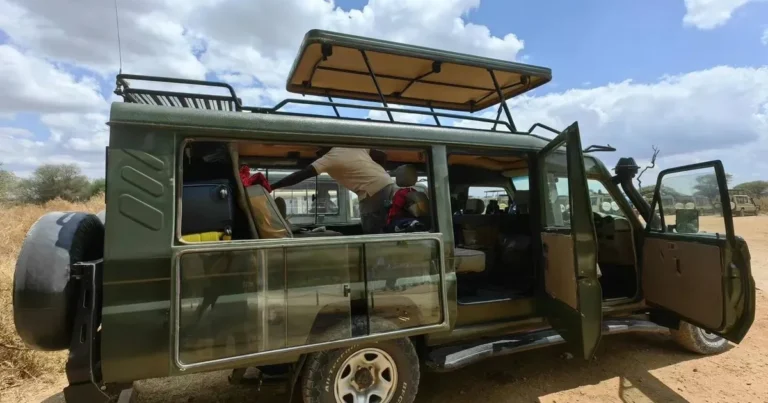 Open-sided safari vehicle prepared for wildlife viewing in the Serengeti