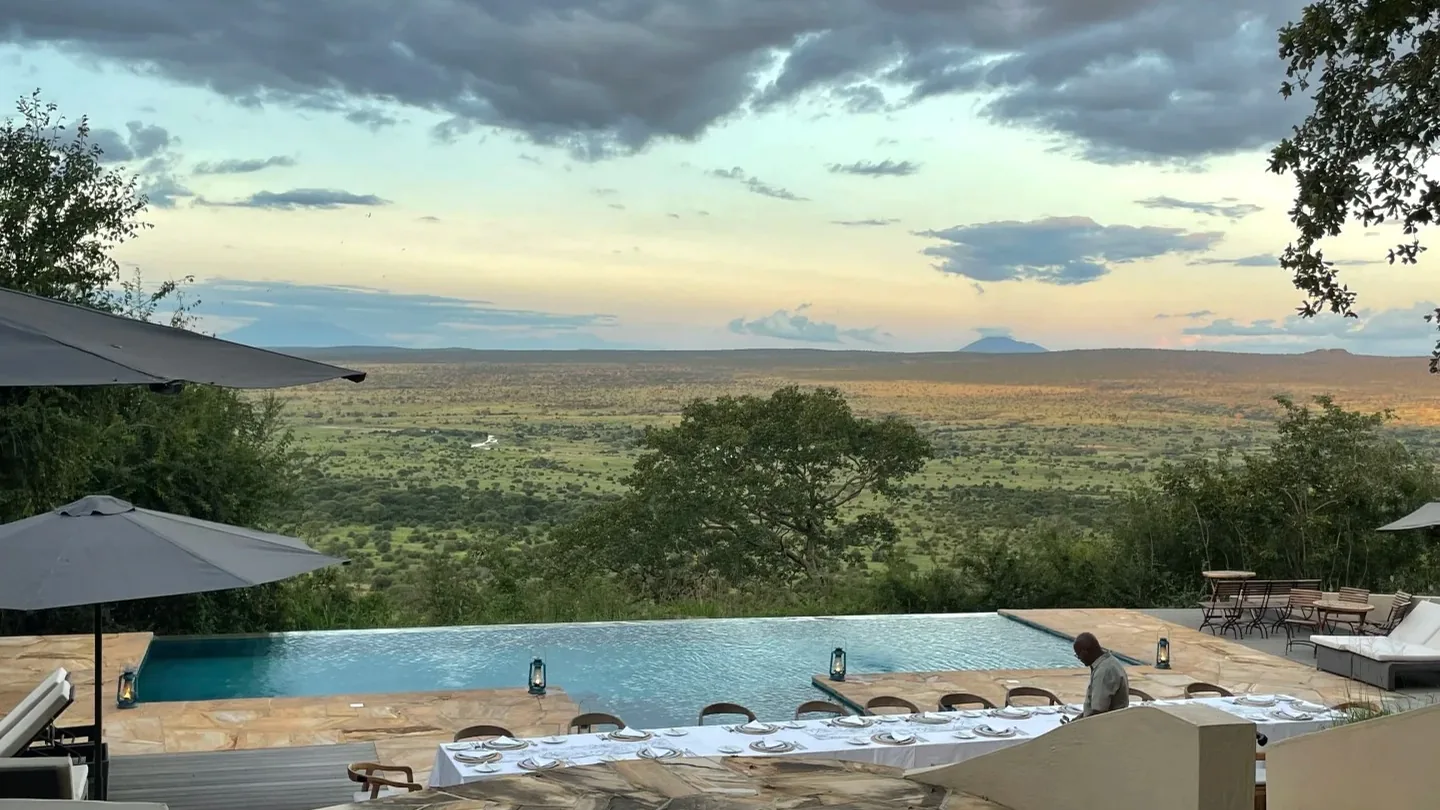 Infinity pool overlooking the Tanzanian savanna at a luxury safari lodge